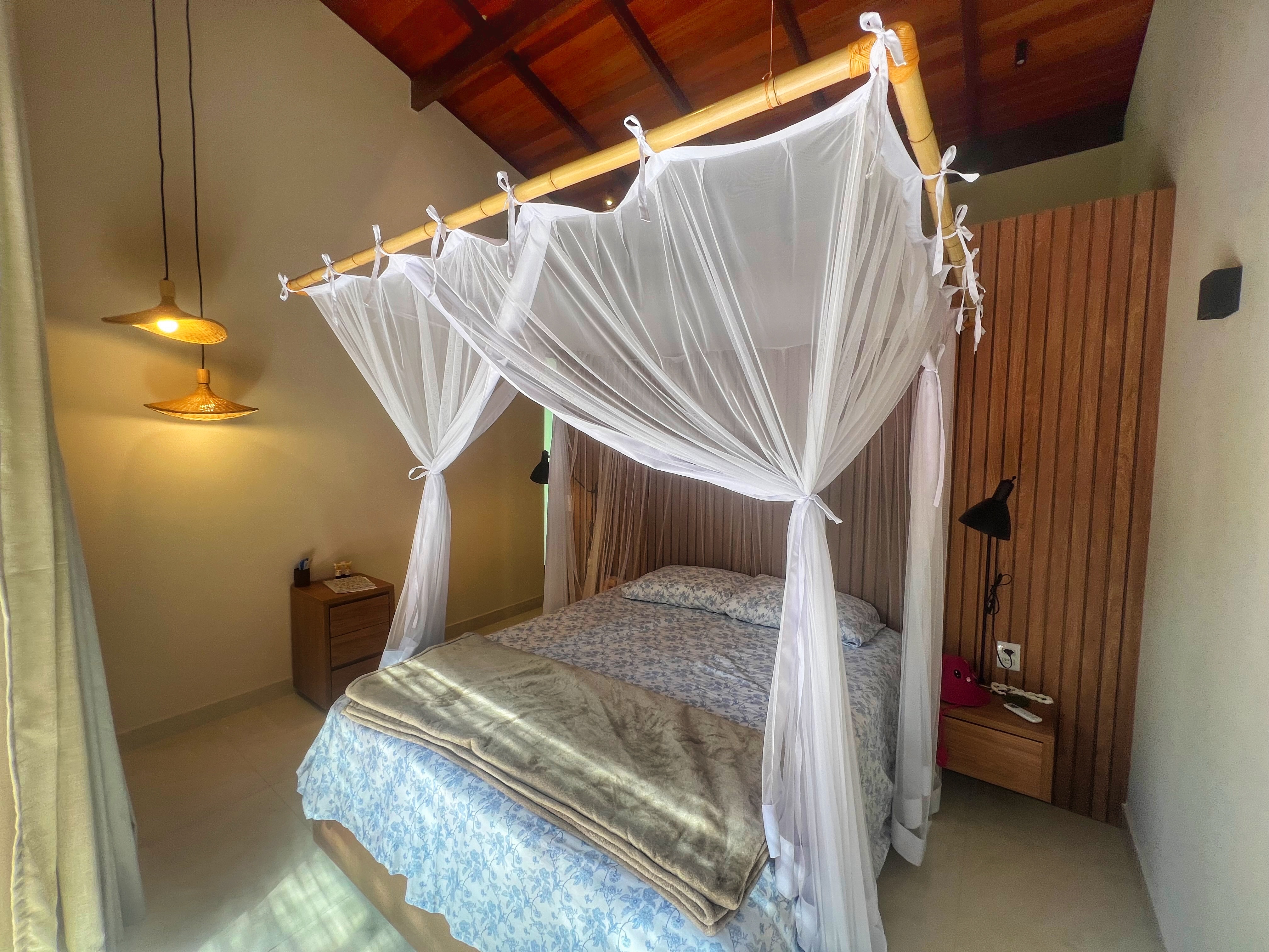 Bedroom with four-poster canopy bed