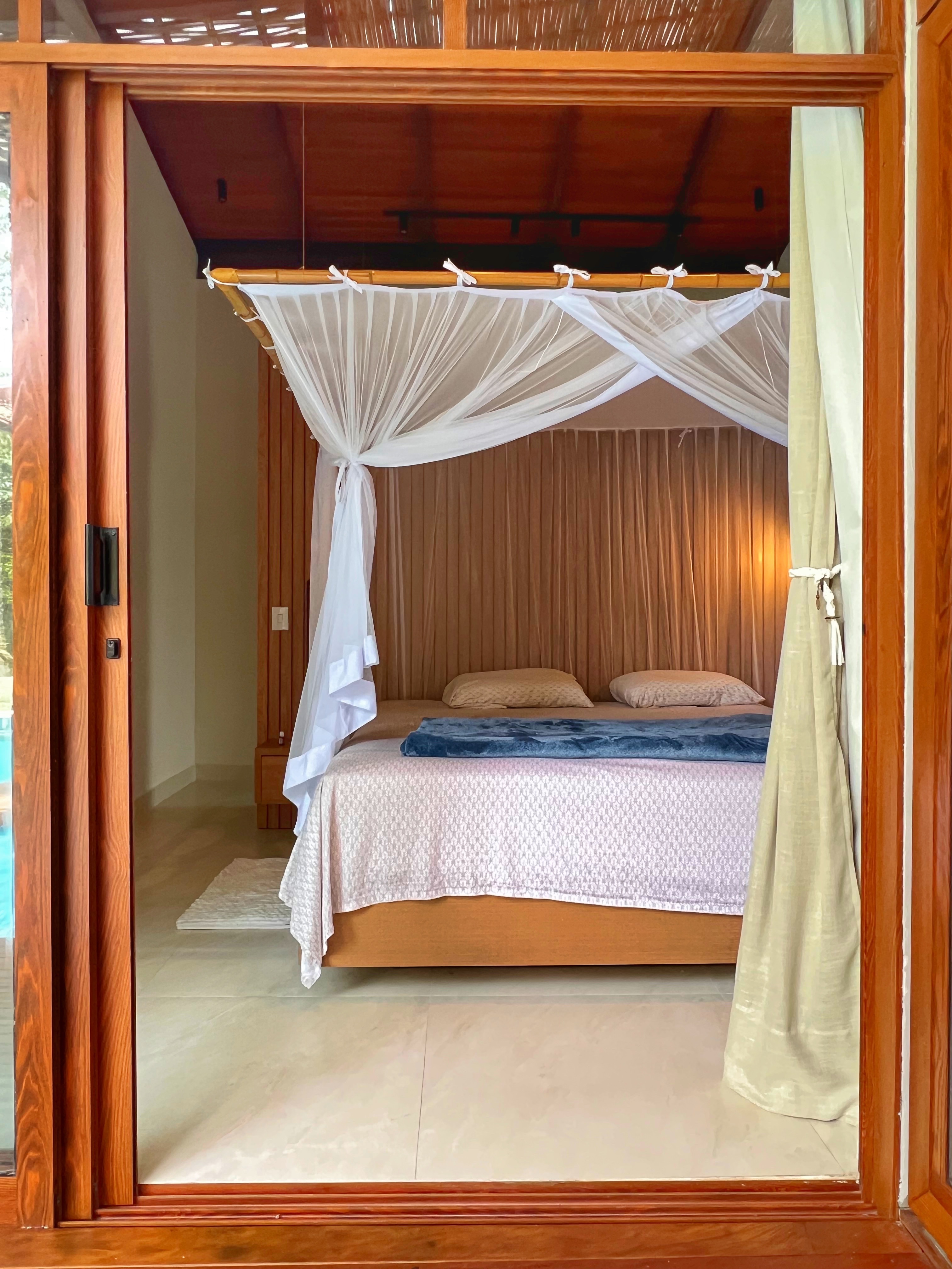 Master bedroom with canopy bed